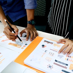 hands on a chart